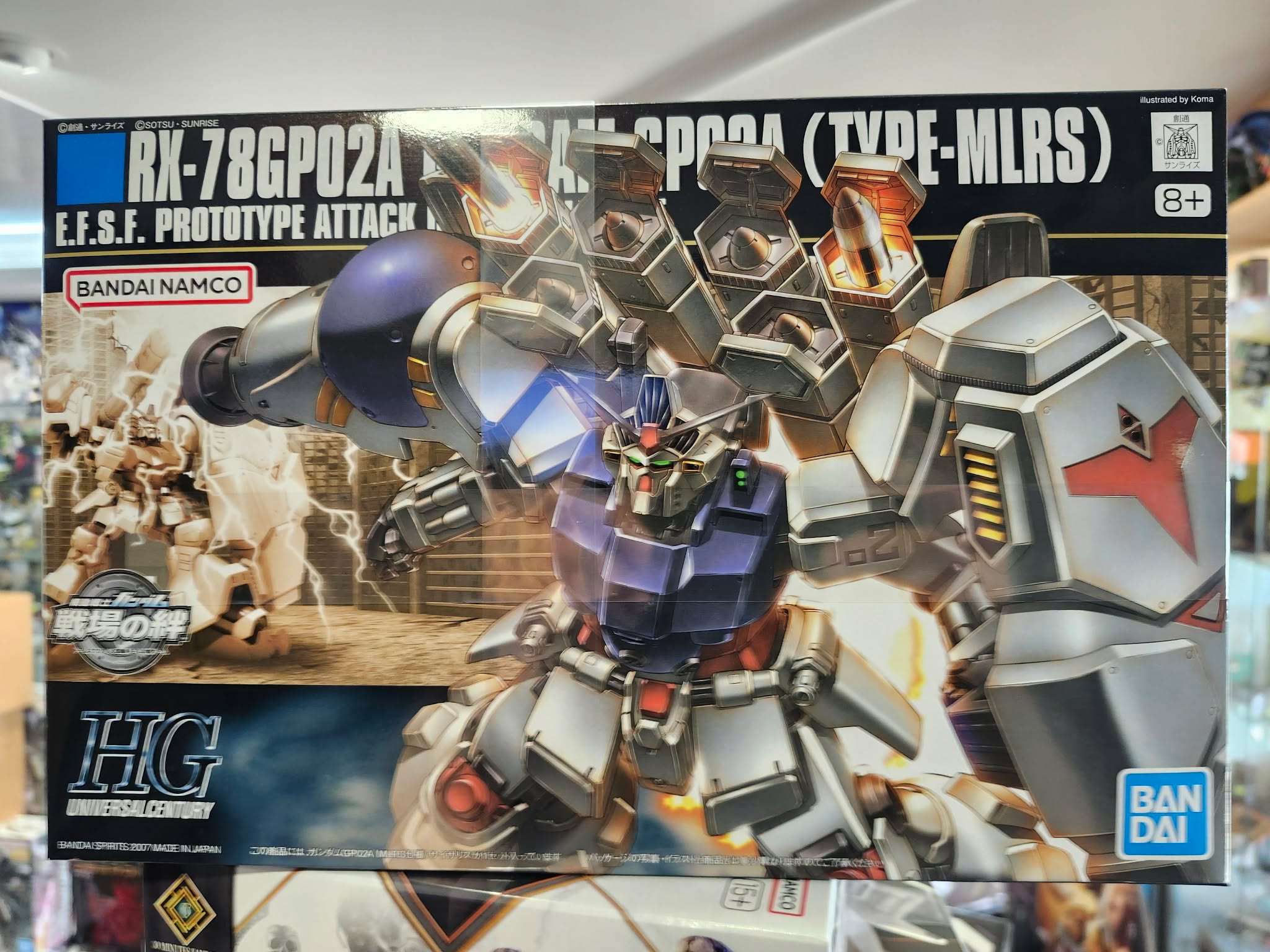 Photographie de la boîte de maquette Bandai représentant le HG Gundam RX-78GP02A Gundam Physalis, un modèle Gunpla High Grade emblématique de Gundam 0083.