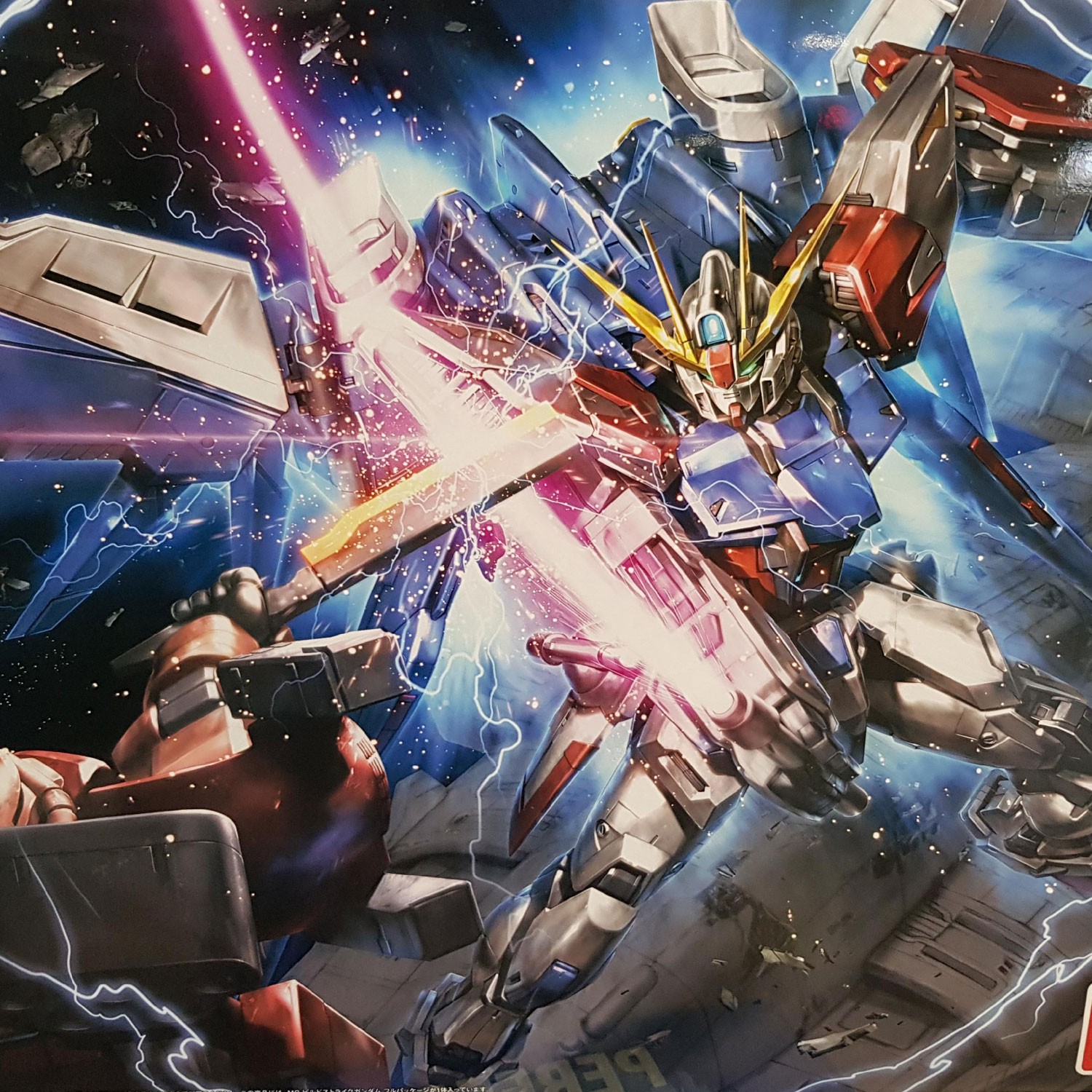 Photographie de la boîte de maquette représentant le MG Build Strike Gundam, un modèle Gunpla Master Grade 1/100 au design dynamique et personnalisable.